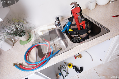 Image of Kitchen Water tap and sink.