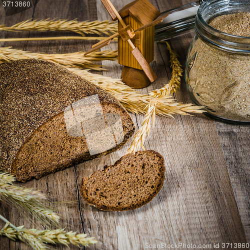 Image of Black homemade bread and rye cones