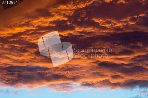 Image of Dramatic sunset sky with clouds.