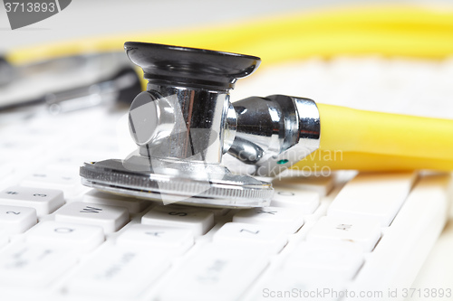 Image of Stethoscope on the keyboard