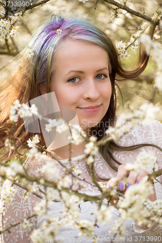 Image of cheerful fashionable woman in spring