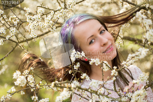 Image of cheerful fashionable woman in spring