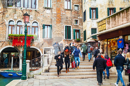 Image of Crowded with tourists Nuova street in Venice