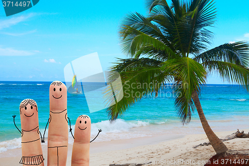 Image of Happy family on the beach. Exotic vacation
