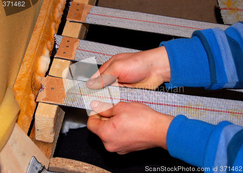 Image of hands,repairing