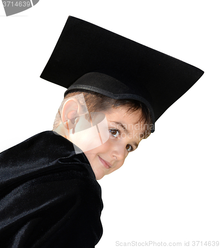 Image of Cute kid graduate with graduation cap