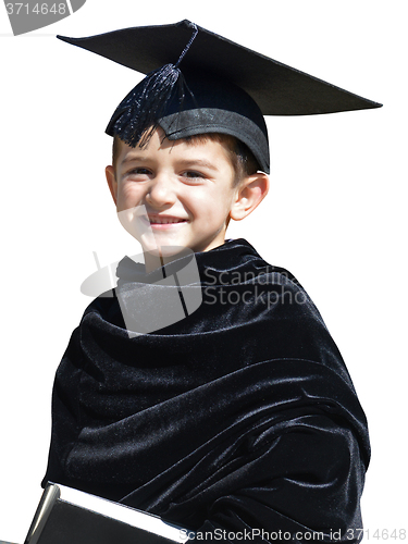Image of Happy kid graduate with graduation cap