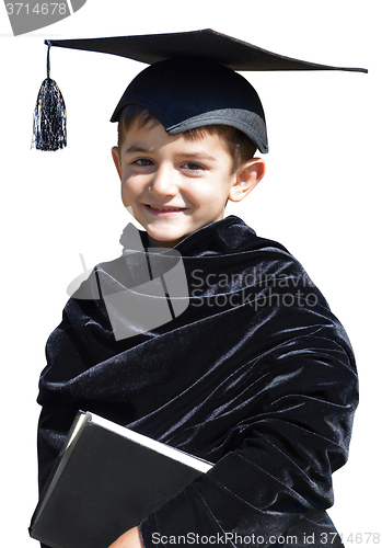 Image of Happy kid graduate with graduation cap