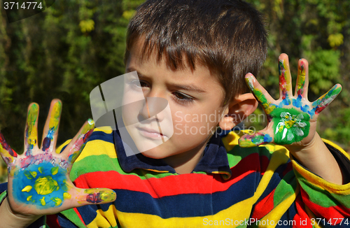 Image of Hands in paint