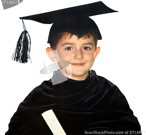 Image of Happy kid graduate with graduation cap