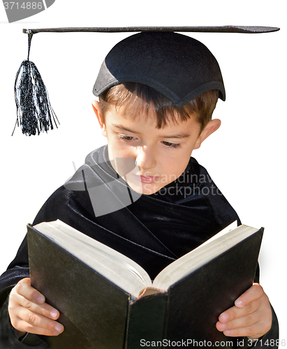 Image of Cute kid graduate with graduation cap