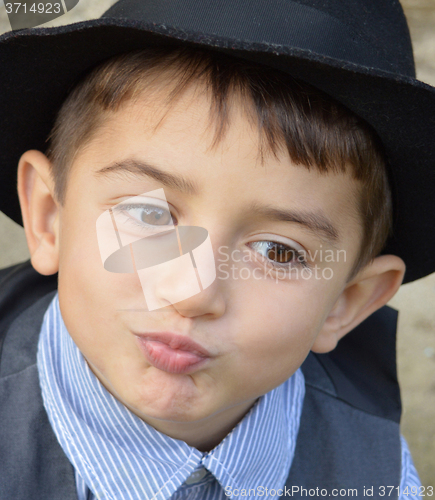 Image of Kid gives a kiss