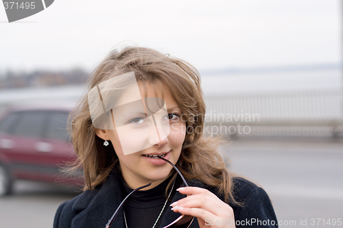 Image of Portrait of the beautiful girl outdoor 2