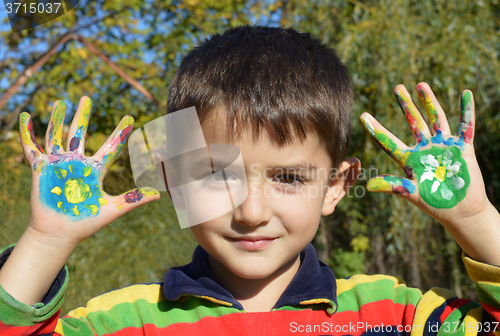 Image of Hands in paint
