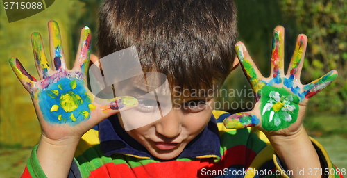 Image of Hands in paint