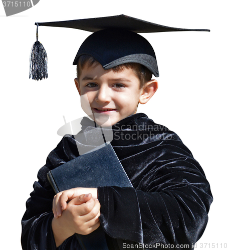 Image of Cute kid graduate with graduation cap