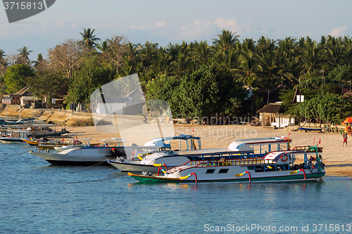 Image of sand beach with boat, Bali Indonesia