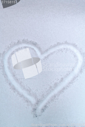 Image of Heart drawn in the snow - a symbol of love