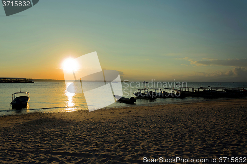 Image of Nusa penida, Bali beach with dramatic sky and sunset