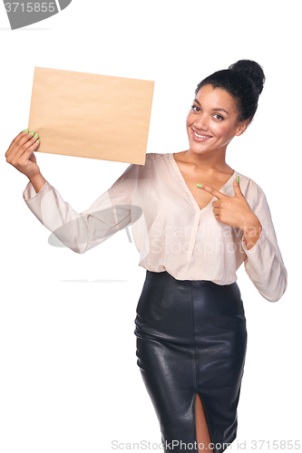 Image of Smiling businesswoman with parcel
