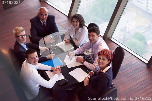 Image of business people group on meeting at modern bright office