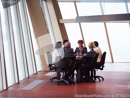 Image of business people group on meeting at modern bright office