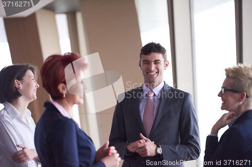 Image of business people group on meeting at modern bright office