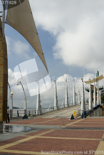 Image of walkway bridge with symbol poles malecon 2000 guayaquil boardwal