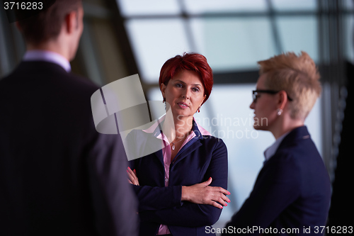 Image of business people group on meeting at modern bright office