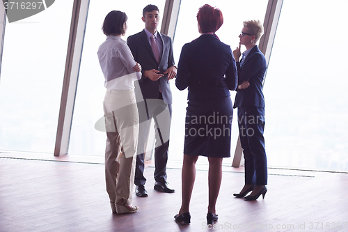 Image of business people group on meeting at modern bright office
