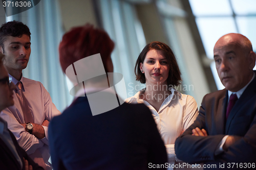 Image of business people group on meeting at modern bright office