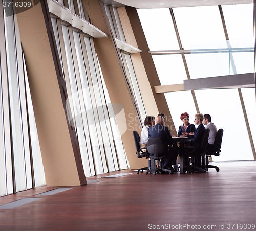 Image of business people group on meeting at modern bright office