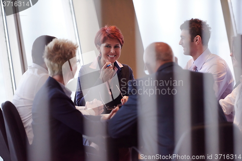Image of business people group on meeting at modern bright office