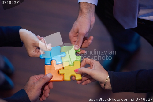 Image of assembling jigsaw puzzle