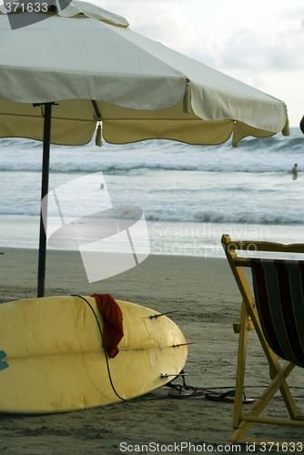 Image of surfboard on beach ecuador