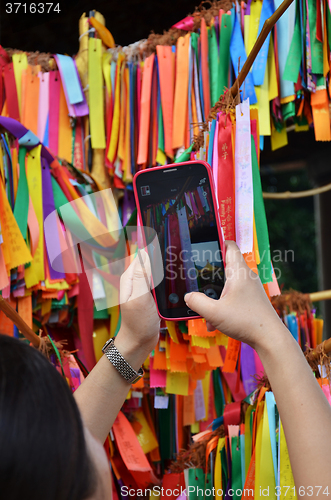 Image of Blessing ribbons hang outside in Kek Lok Si, Penang