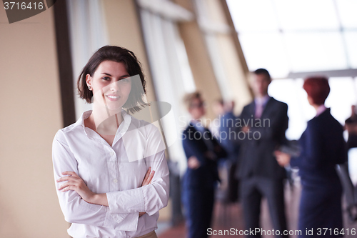 Image of young startup  business woman portrait, lbured people group in b