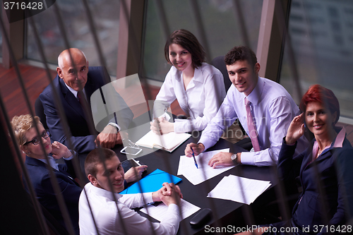 Image of business people group on meeting at modern bright office