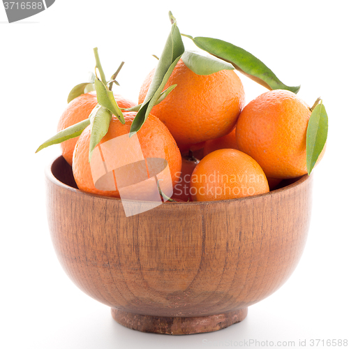 Image of Tangerines on wooden  bowl 