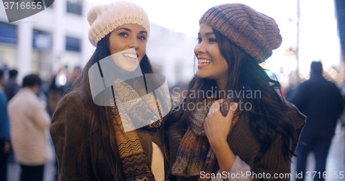 Image of Two stylish young women in winter fashion