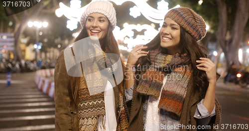 Image of Two young women enjoying a night on the town