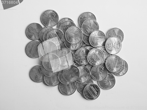 Image of Black and white Dollar coins 1 cent