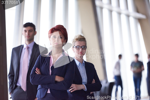 Image of diverse business people group with redhair  woman in front