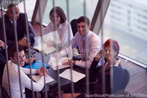Image of business people group on meeting at modern bright office