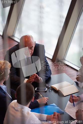Image of business people group on meeting at modern bright office
