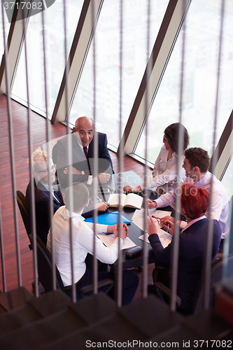 Image of business people group on meeting at modern bright office