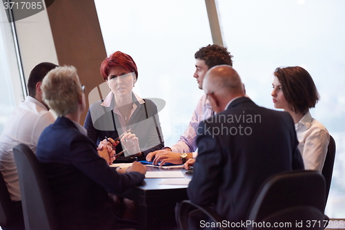 Image of business people group on meeting at modern bright office