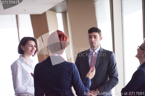 Image of business people group on meeting at modern bright office