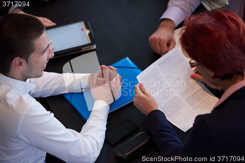 Image of business people group on meeting at modern bright office