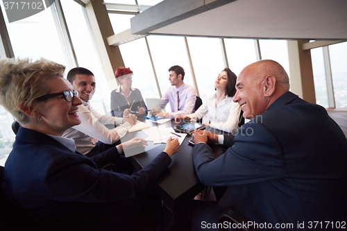 Image of business people group on meeting at modern bright office